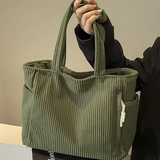 Edit – Ribbad toteväska med snodddetalj