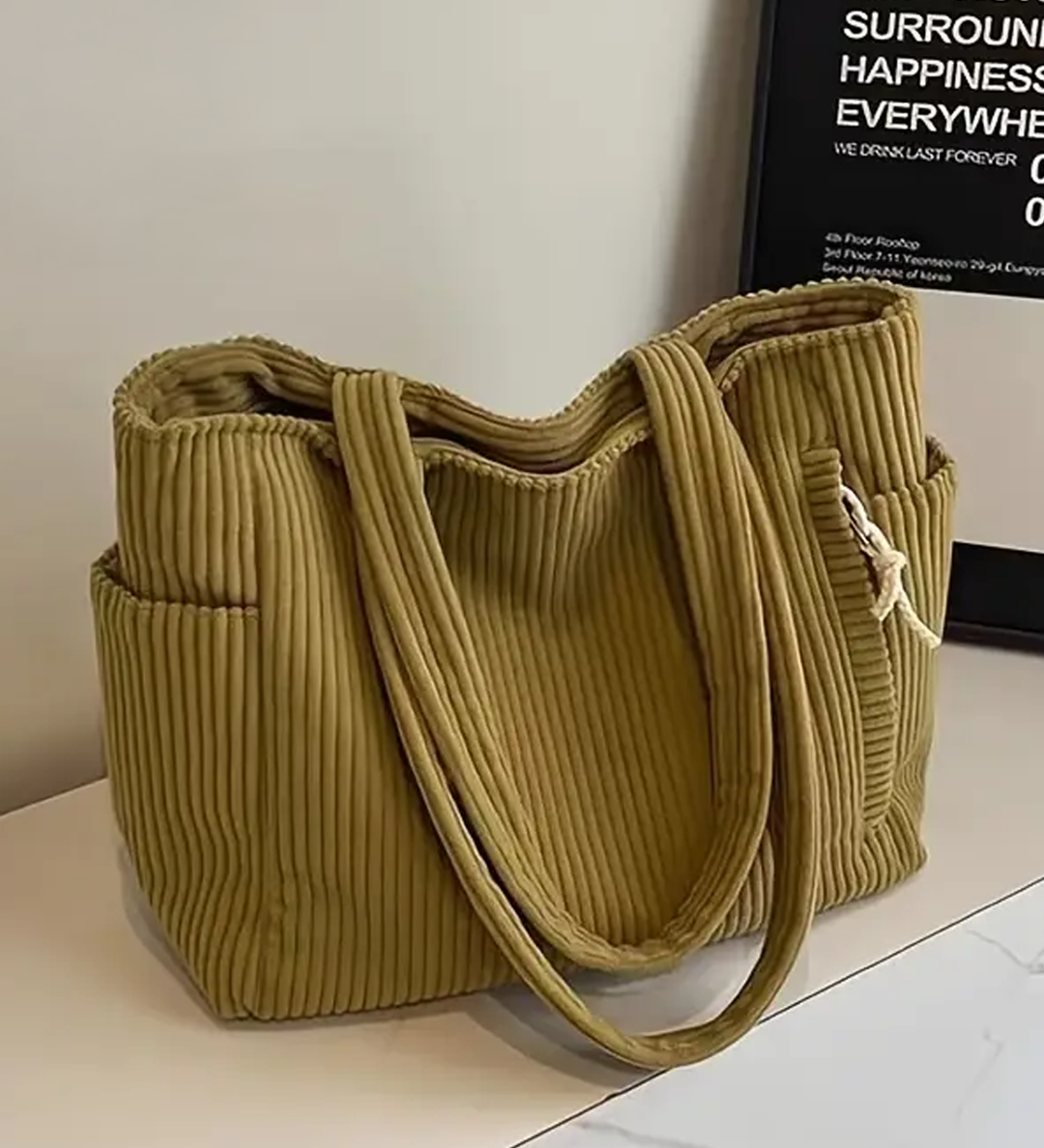 Edit – Ribbad toteväska med snodddetalj