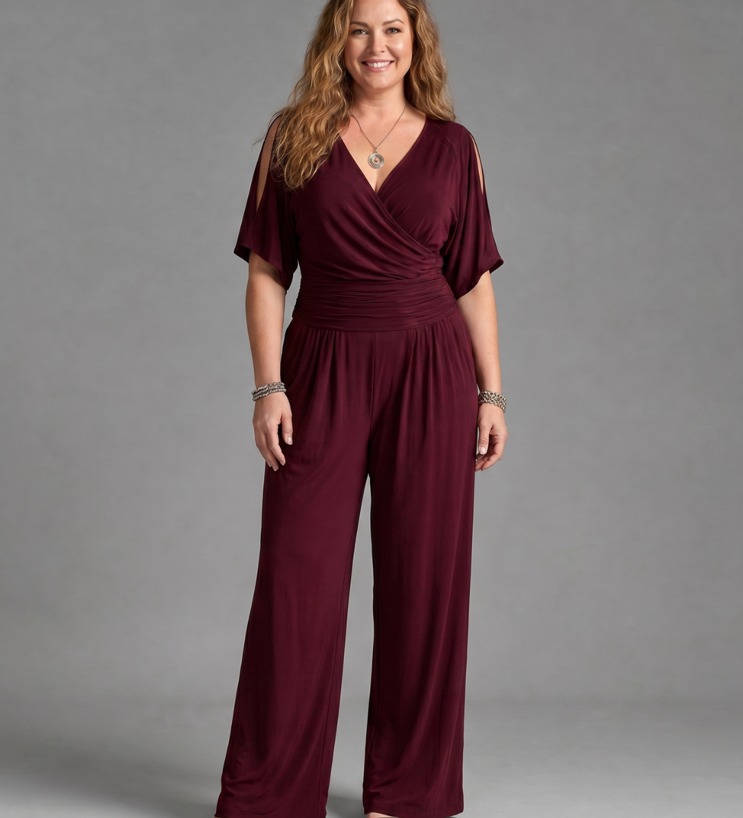 Tilda – Avslappnad overall med cold shoulder och omlottmidja