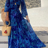 Ulla – Lång blomtrycksklänning med off-shoulder-ärmar