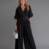 Ragnhild – Draperad overall med v-ringning och vida ben