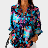 Genoveva - Höstskjorta" can be rewritten as "Genoveva - Autumn Shirt.