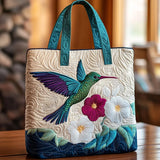 Vivi – Vadderad tote med kolibri och blommor