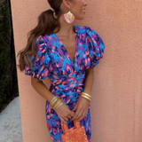 Disa – Livfull plisserad midiklänning